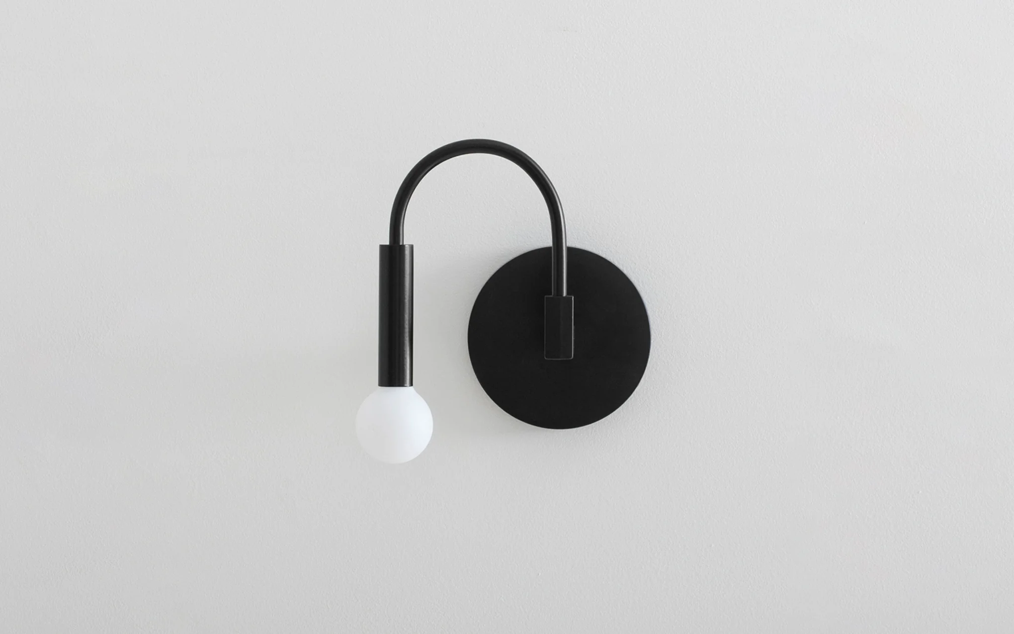 Arch sconce